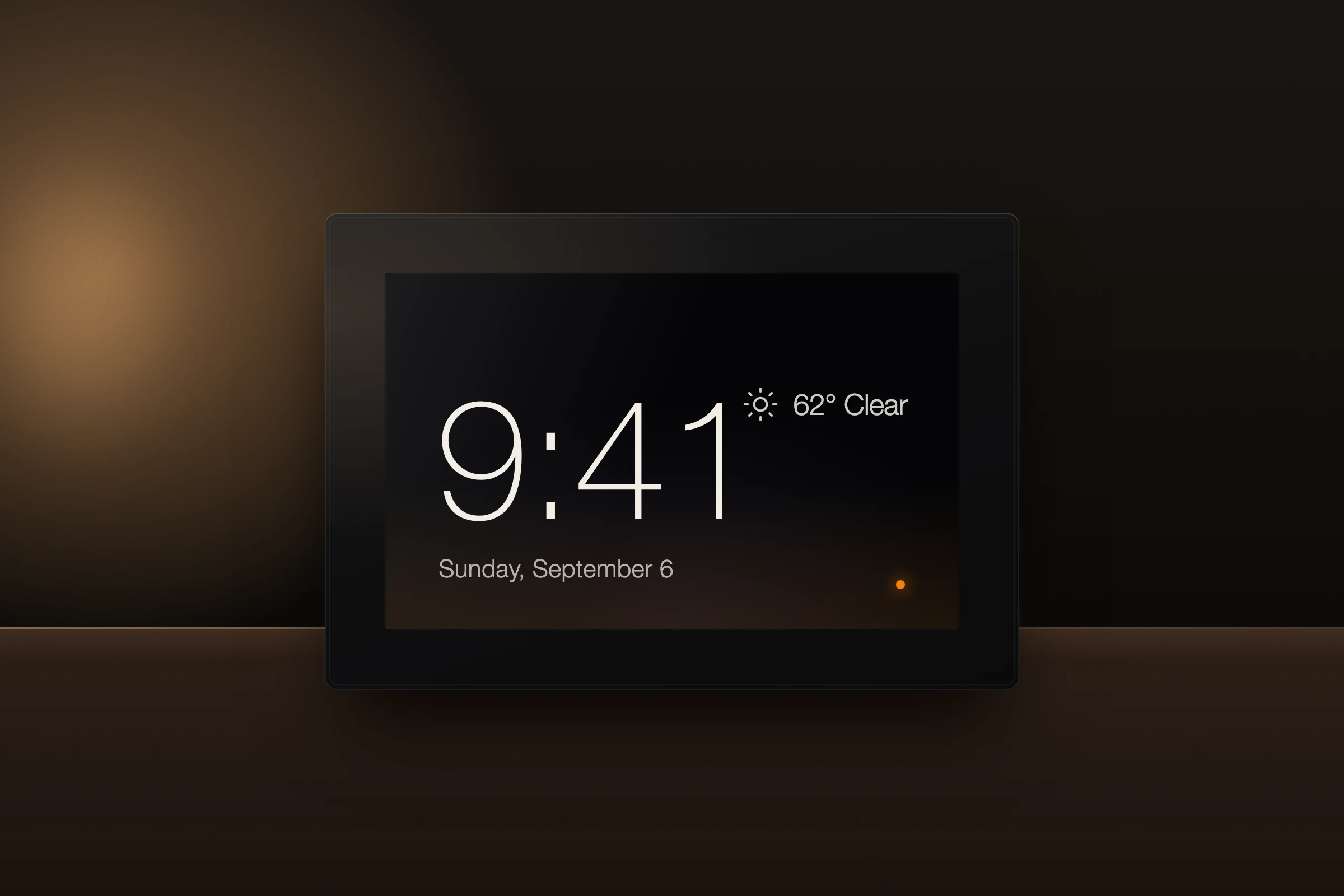FrothFrame in ambient mode on a nightstand, showing the time and weather in a dim room